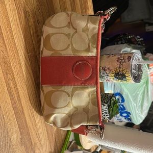 Brown and pink coach purse